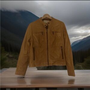 Item for sale: Micheal Kors butterscotch moto jacket size L.